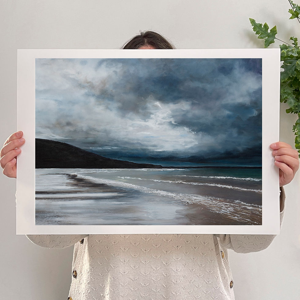 Thumbnail: The artist Charlotte Englefield holding an A2 sized print of a painting of a seascape