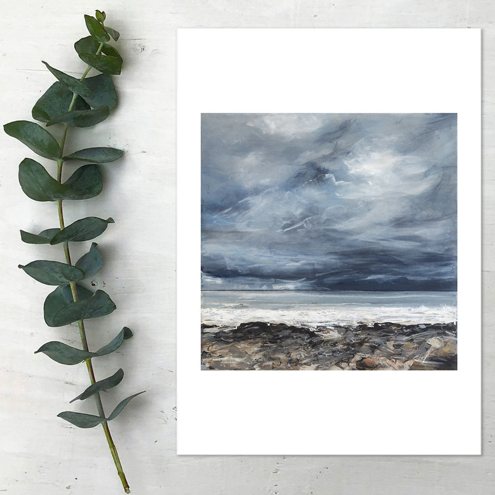 Thumbnail: Print of a painting of a seascape. This print is lying flat on a neutral painted surface with a eucalyptus stem beside it
