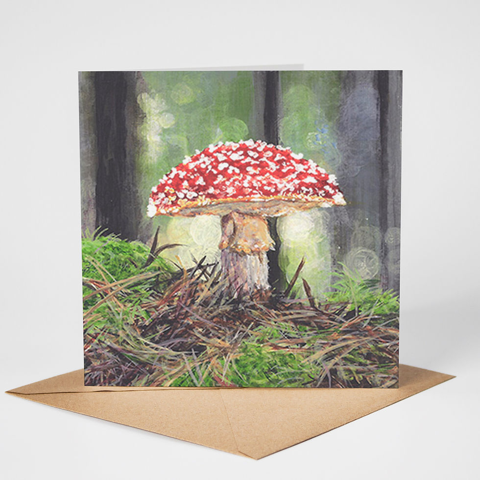 A greeting card of a Toadstool. The card is standing upright on a Kraft brown envelope
