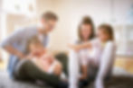 Family playing in livingroom
