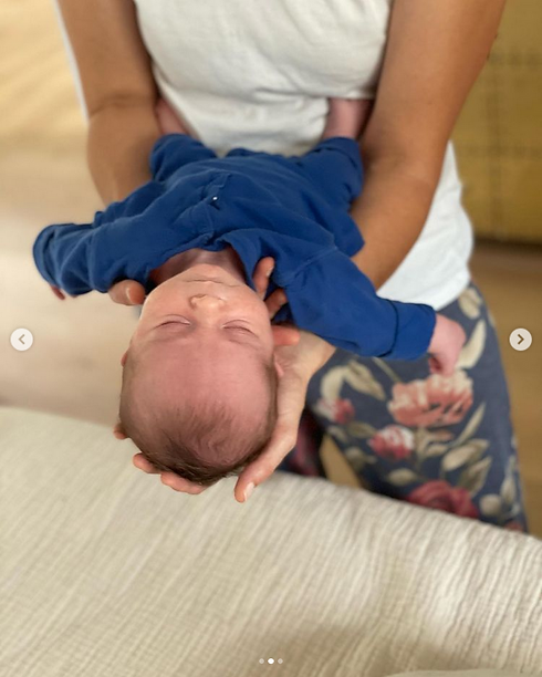 Cori with baby h 2021 2.png