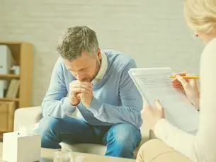 Concerned patient with therapist