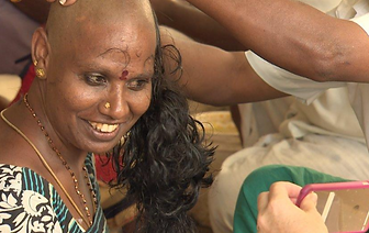 Indian Woman Shaving Head Tonsuring_edit