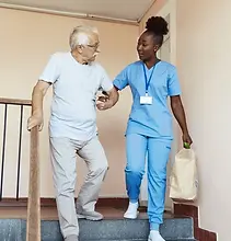 doctor-nurse-caregiver-helping-disabled-600nw-2532560271.webp