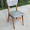 Miniature : Chaise de bureau scandinave bois massif et cuir skaï gris