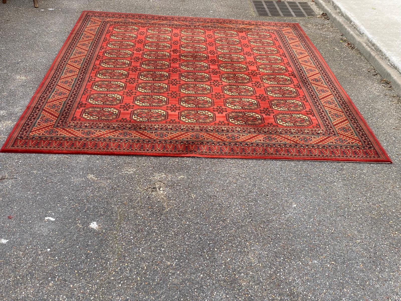 Tapis persan en laine rouge bordeaux Louis de Poortere 250x350cm