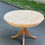 Miniature : Table à manger ronde extensible pied central rénovée en bois brut 150cm