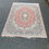 Miniature : Tapis persan bordeaux en laine motifs fleurs 140x190