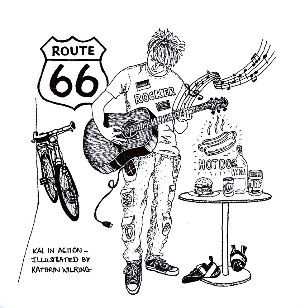 Route 66 musician playing guitar with hot dog