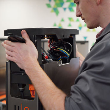 Person building and EV charger