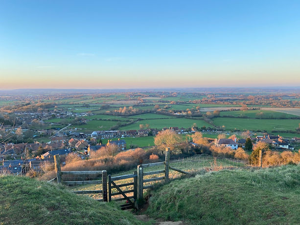 The view across Stoke-sub-hamdon, Somerset from Ham Hill with a Gabor Mate quote.