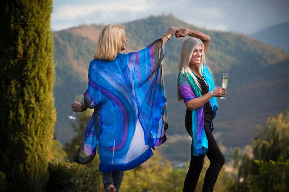 Thumbnail: Dancing on a mountain top with champagne. Wrap yourself in luxury! Hand painted wearable art silk ruana is similar to a cape