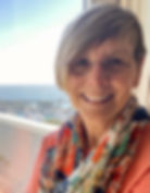 photo of the author in front of the ocean