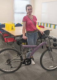 refugee lady with a new bike