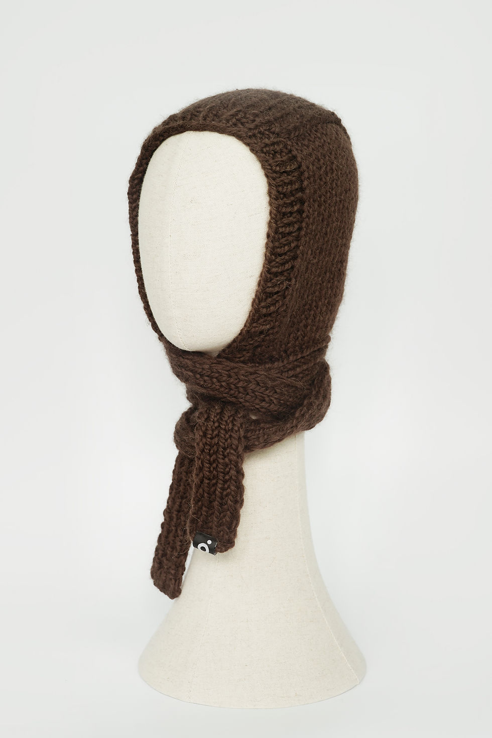 Thumbnail: Brown hand-knit bonnet front detail view
