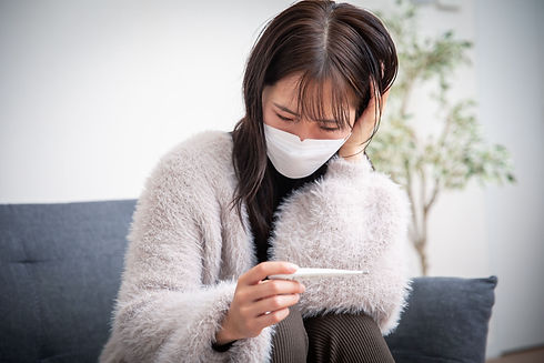 体調を崩した女性