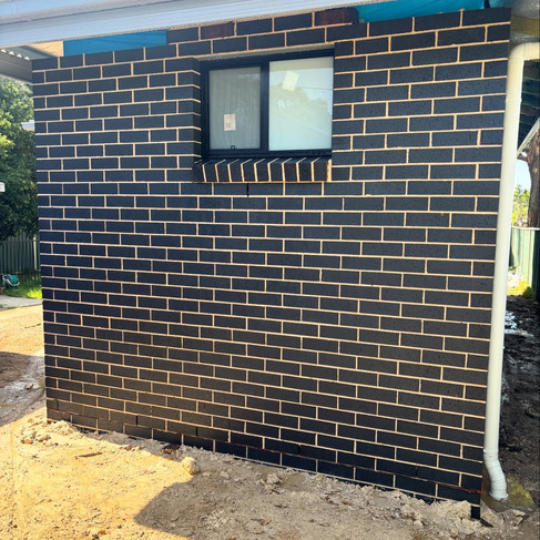 Clean brick facade after professional washing, showing consistent finish and restored appearance