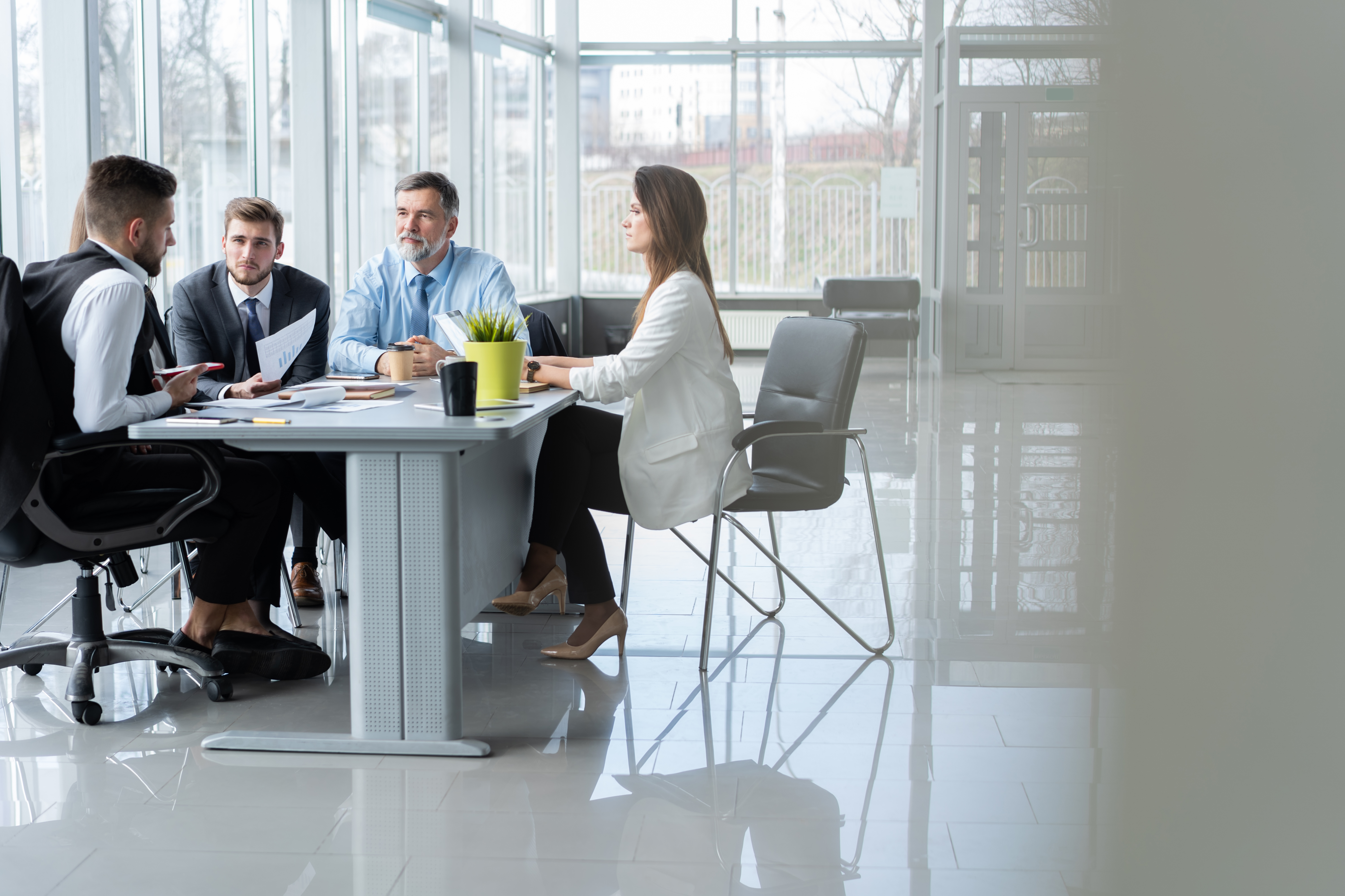 businesspeople-discussing-together-conference-room-meeting-office.jpg