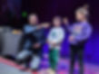 Felix Riba, Pittsburgh magician, engaging young participants during a stage magic show.