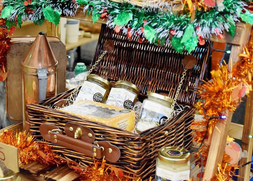 Thumbnail: Dark wicker gift basket with full glen heather honey range displayed