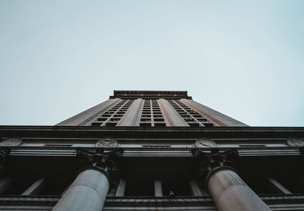 low-angle-shot-tall-business-building-nyc.jpg