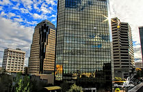 Cloudsinthetowers12x18wlogo.jpg