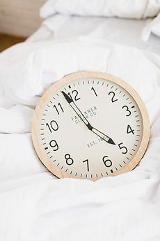 Clock on bedsheets