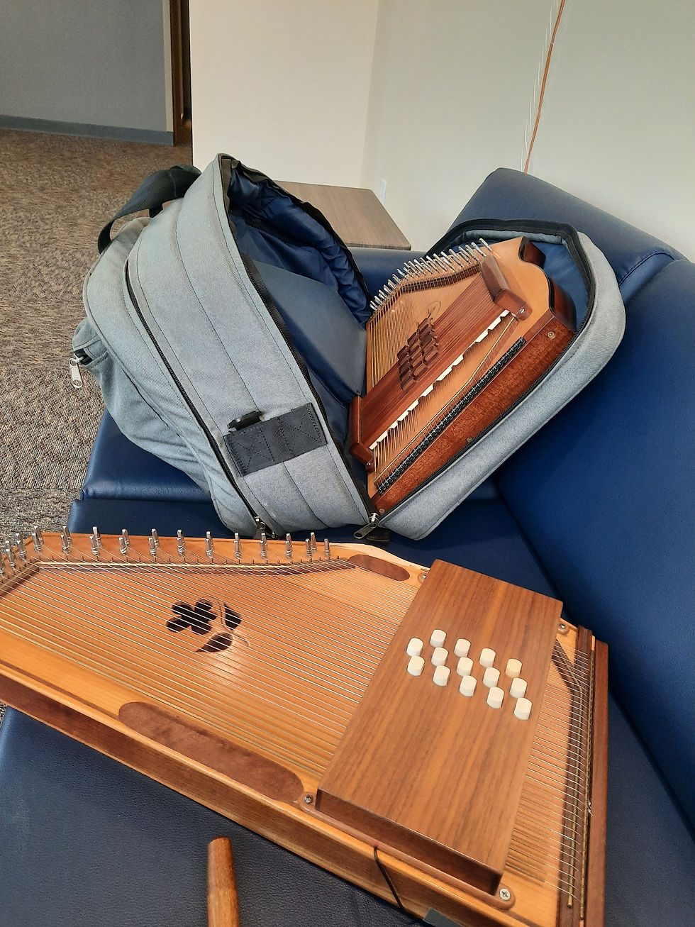 Close-up view of a beautiful autoharp with a wooden finish