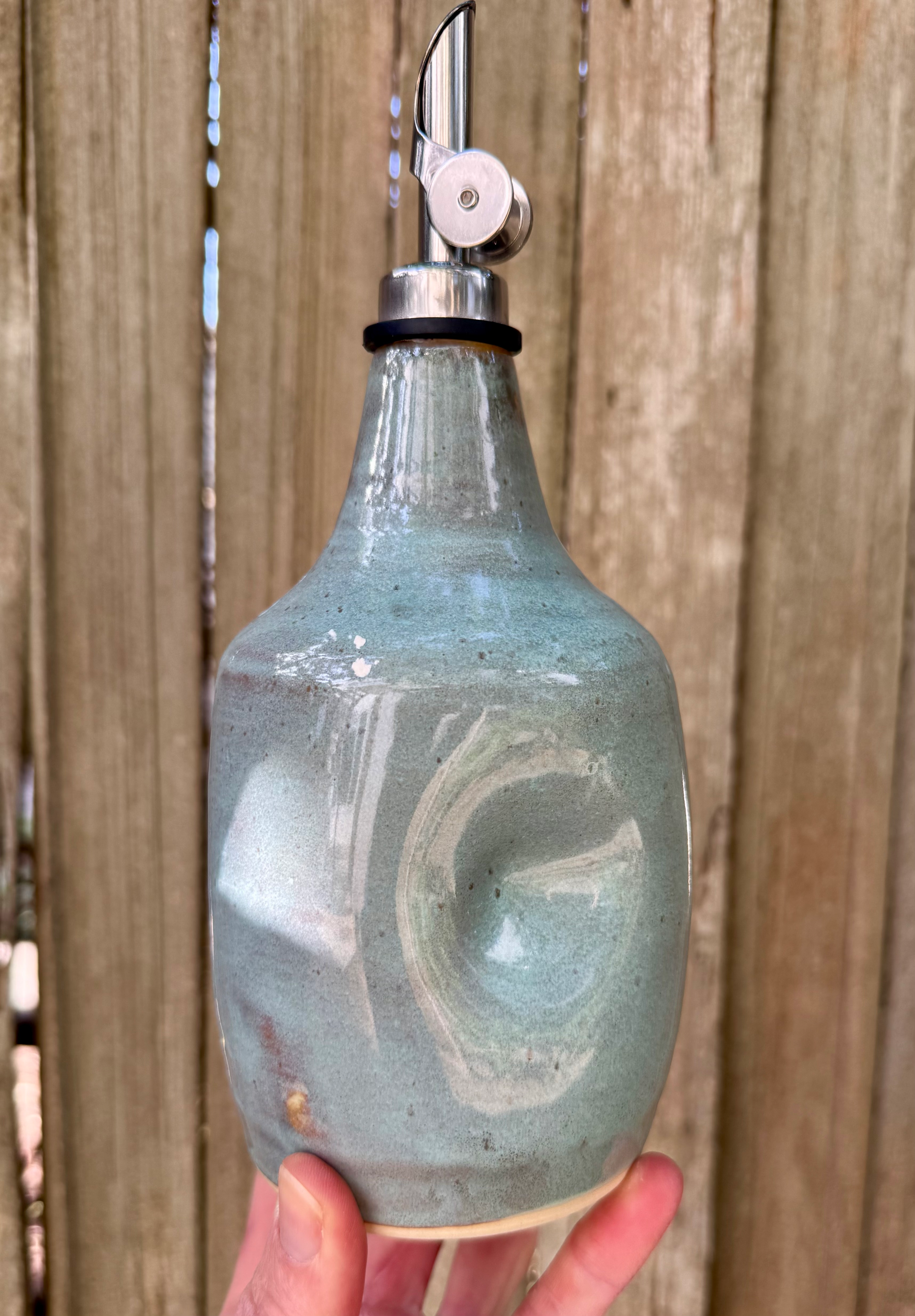 Blue/green oil bottle