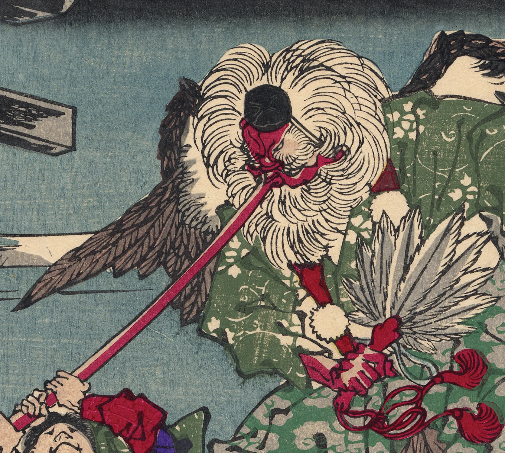 Tengu wrestling with a man.