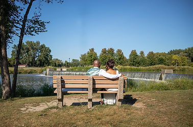 couple sitting in park in chicago while posing for engagement photos chicago engagement photographer engagement photography in chicago photographed by pamela l king photography