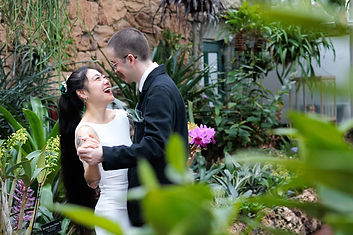 couple taking photos after wedding ceremony in chicago photographed by pamela l king photography