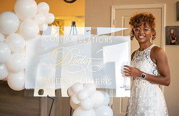 woman posing for a photo at a celebratory event in chicago Jaleesa m Harris photographed by Pamela l king photography