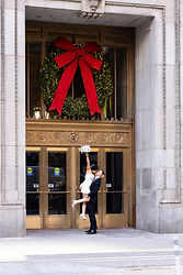 couple posing for wedding photos at city hall in chicago photographed by pamela l king photography