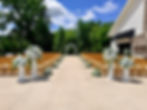 Thumbnail: Wood Pillars with white delphinium flowers 