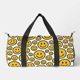 Happy smiling face patterned duffel bag with black straps and zipper closure.