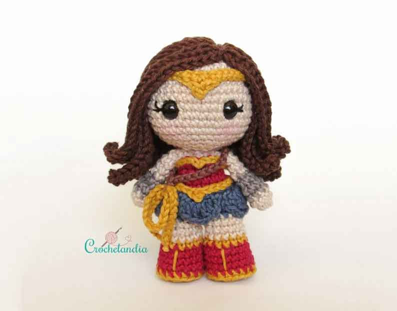 Wonder Woman crochet doll with red, blue, and gold costume, a cute DC Comics crochet pattern.