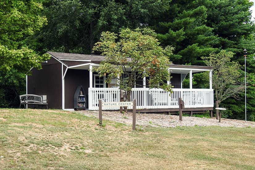 Nature Center building with a white porch at Paint Creek State Park Campground.