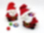 anta Claus crochet patterns featuring round Santa dolls with space for holiday candies.