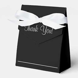 Black tent favor box with white ribbon and Thank You script text