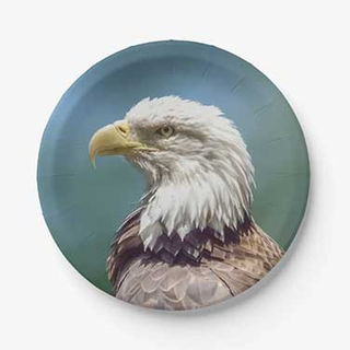 Paper plate featuring a bald eagle side profile against a soft green background