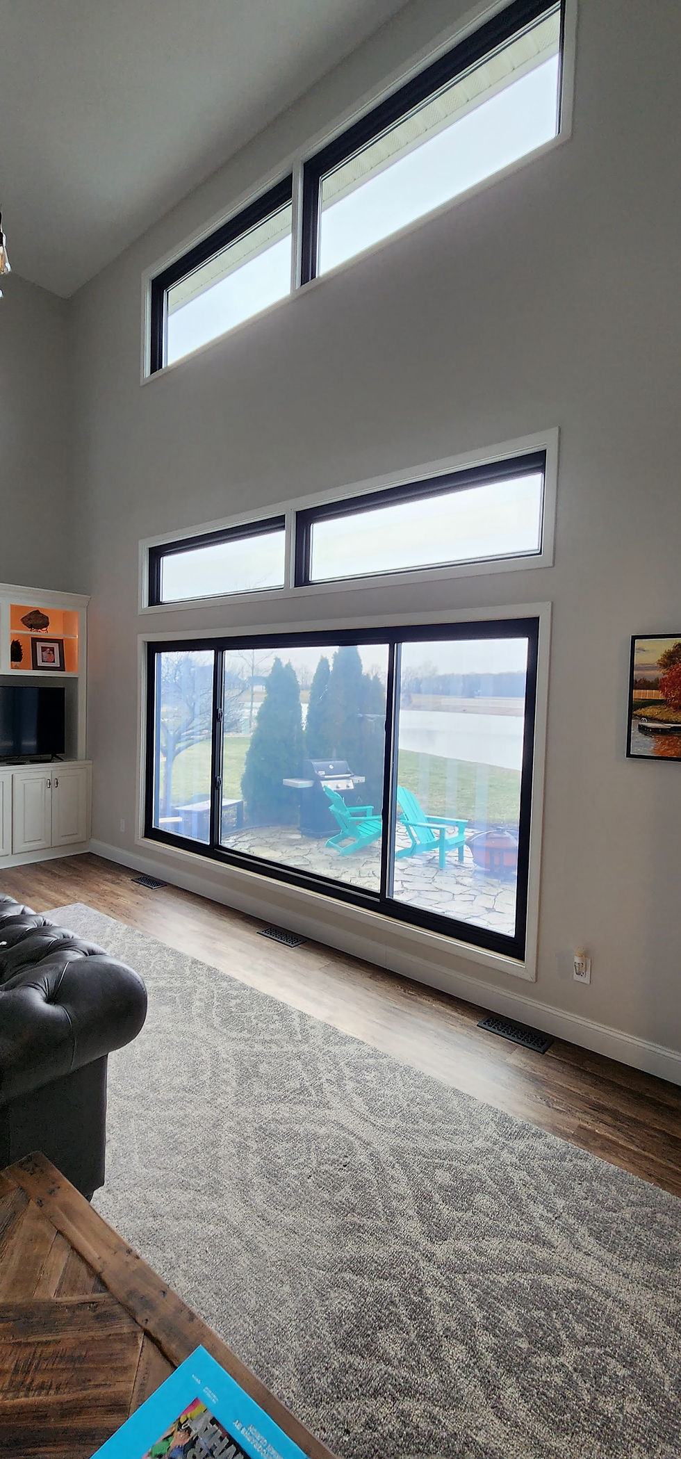 Modern living room with new window and door installation