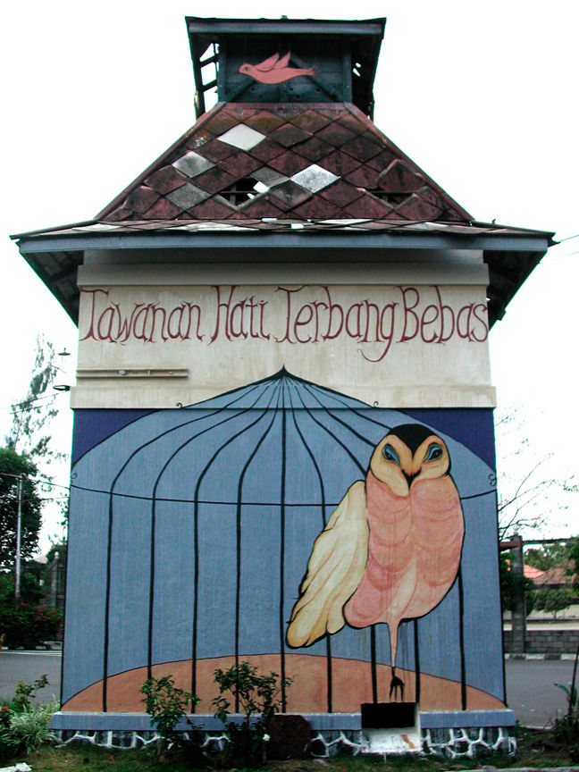 Captive Hearts, mixed media mural with wooden birds and bird cages. Ryder Cooley, Indonesia