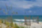 looking-over-the-sand-dunes-and-sea-oats-at-the-beautiful-blue-ocean-sea-beach-nature-natu