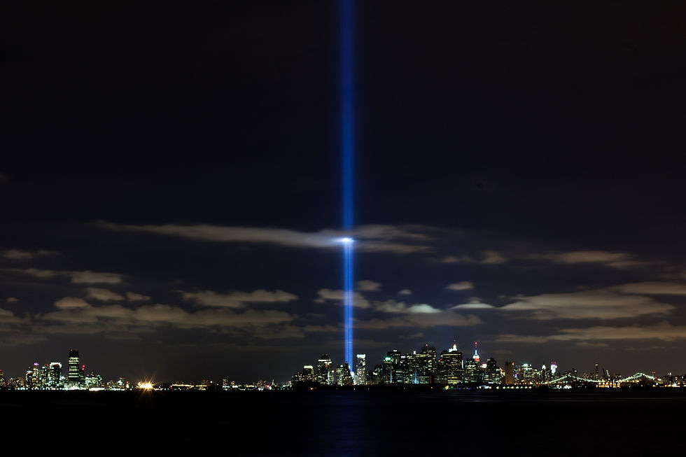 Tribute in Light rising in two columns over Lower Manhattan on the anniversary of September 11