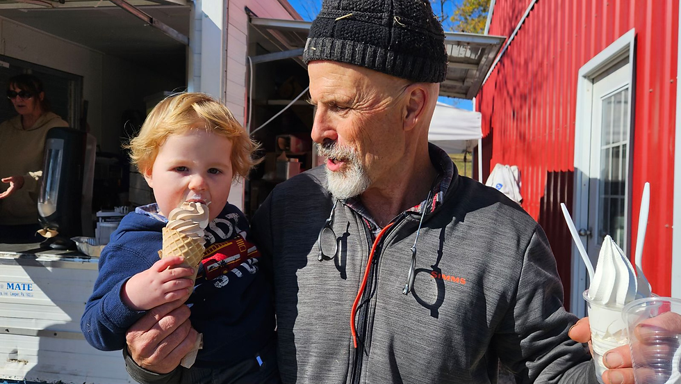 Rev. Rob Merola and his grandson, Finley