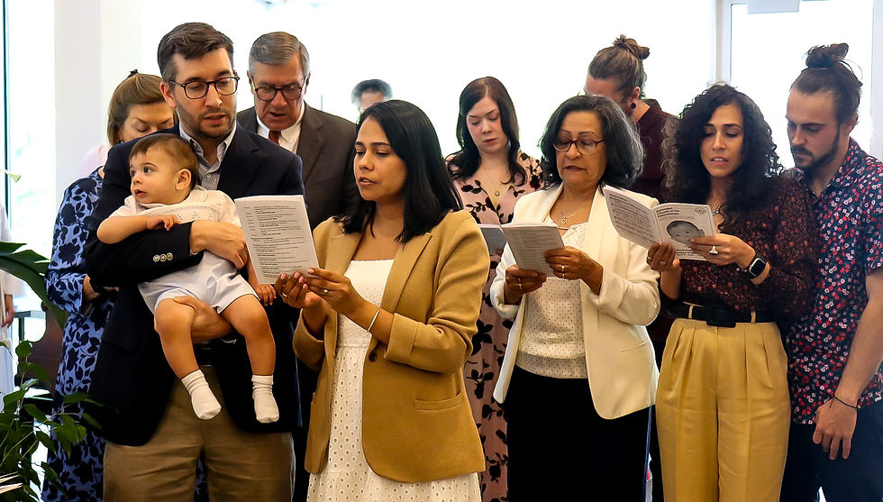 Group celebrating baptism at Episcopal Church of the Resurrection in Alexandria Virginia