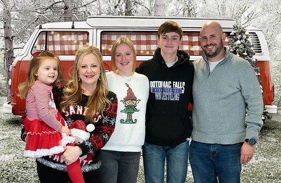 Free Christmas and Advent events and services for families in Sterling, VA, and Loudoun County at St. Matthew's Episcopal Church. Family in Christmas sweaters smiling with joyful holiday background.