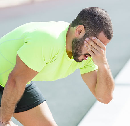 Homme épuisé après l'effort