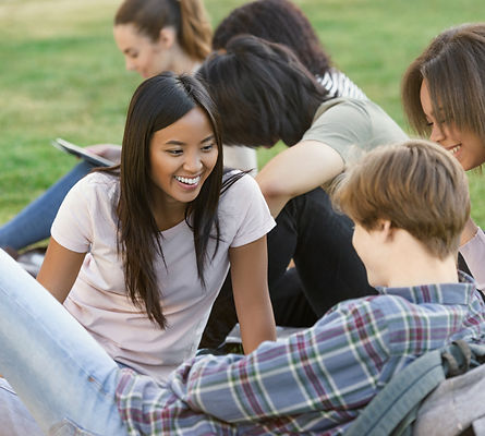 smiling-students-studying-outdoors.jpg